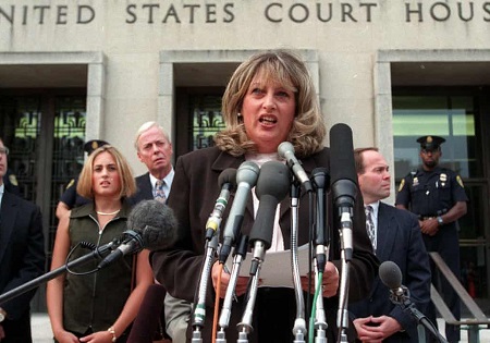 Linda Tripp meets with reporters outside federal court in Washington on 29 July 1998.